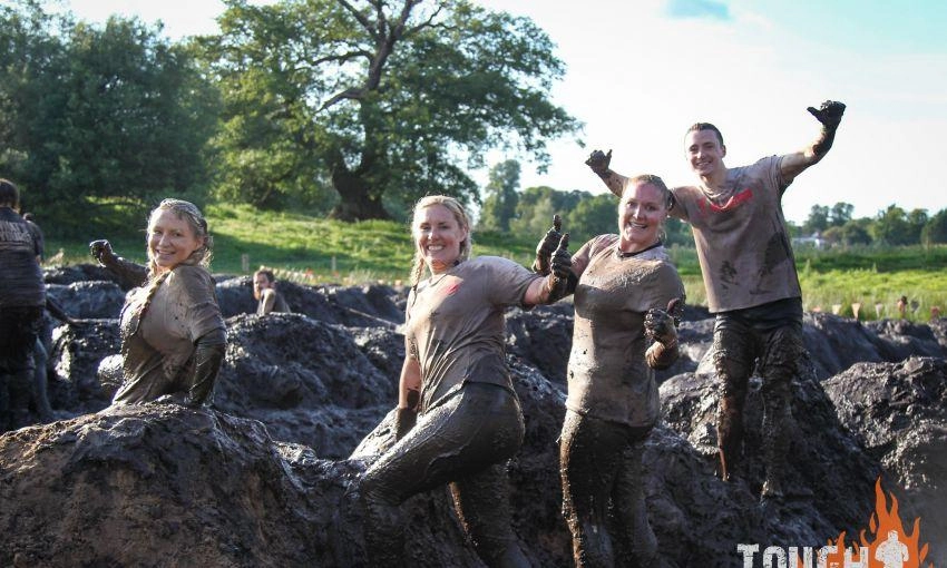 Muddy people at a Foundation Event