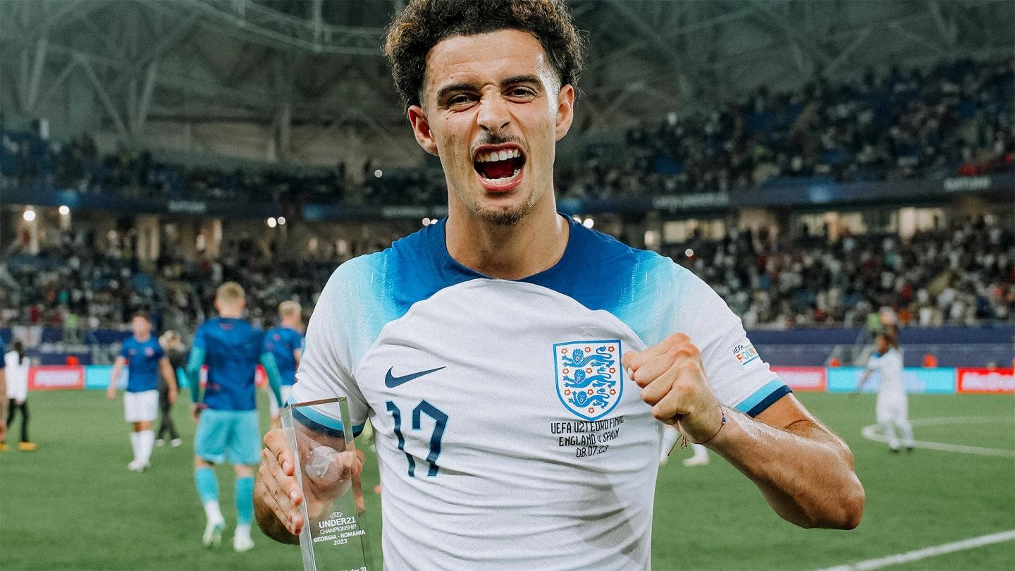 Curtis Jones celebrates winning the trophy and Player of the Match in the U21 European Championship final