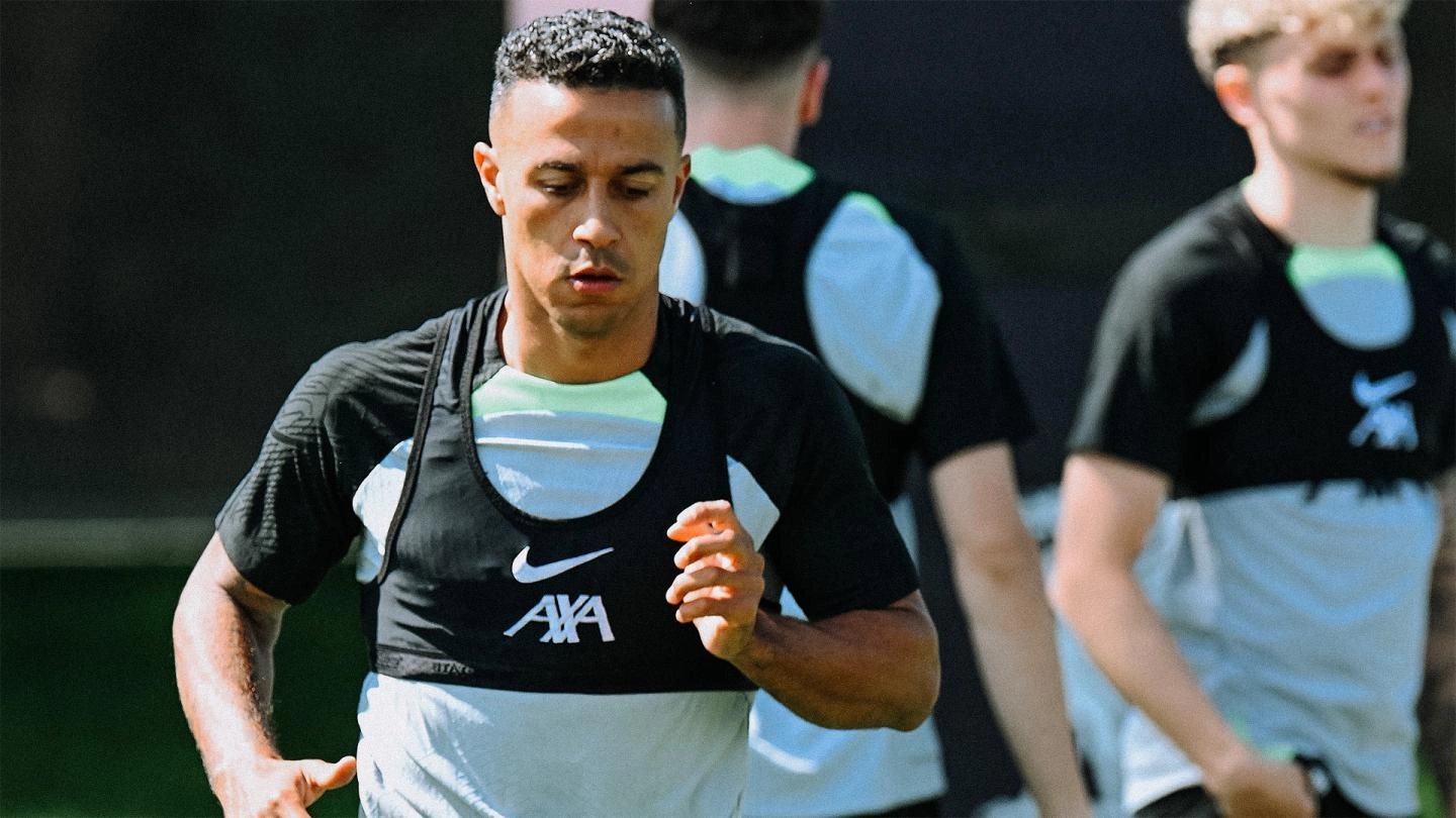 Thiago Alcantara runs during a Liverpool training session