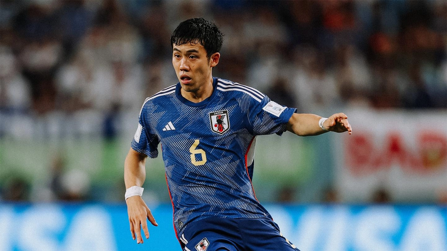 Wataru Endo plays the ball for Japan during a match at the 2022 World Cup