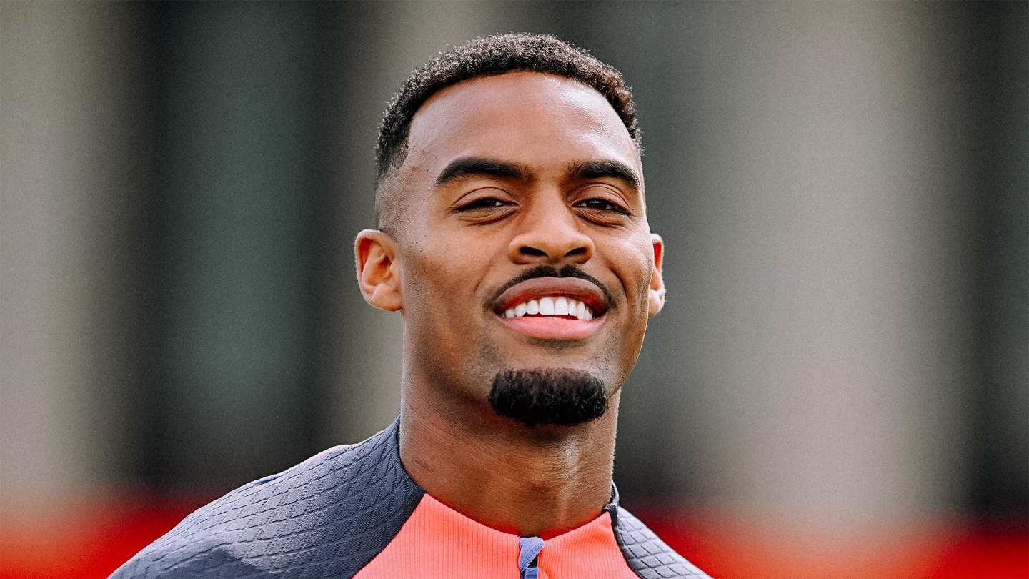 Ryan Gravenberch smiles during a Liverpool FC training session