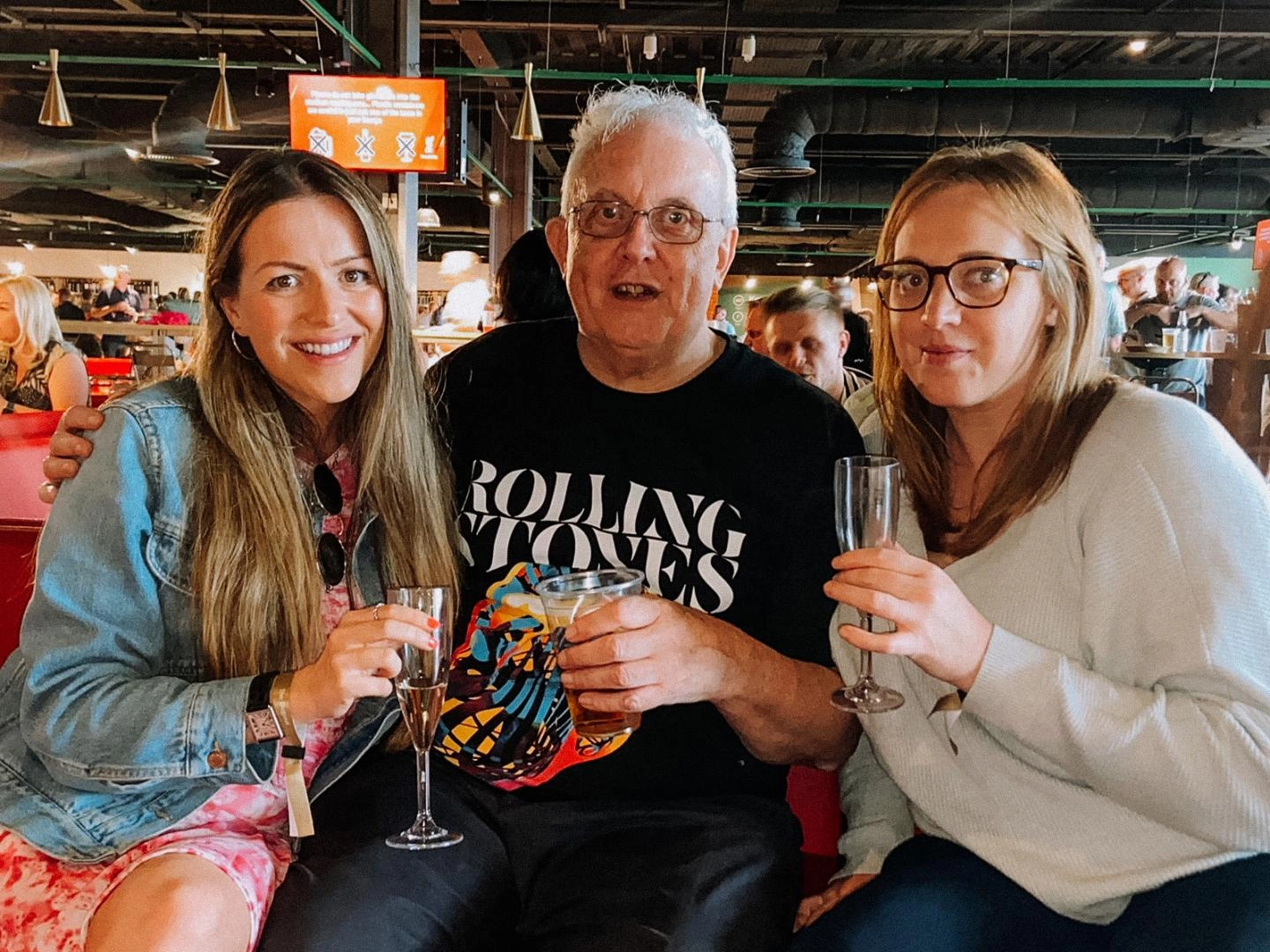 Liverpool fan Jimmy McCarthy pictured with his daughters