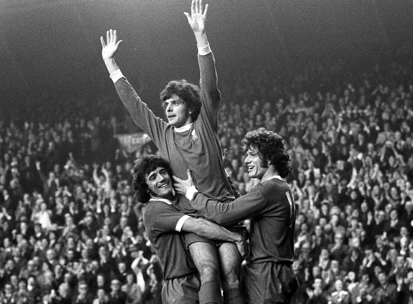 The Reds celebrate during a 4-0 defeat of Manchester City at Anfield