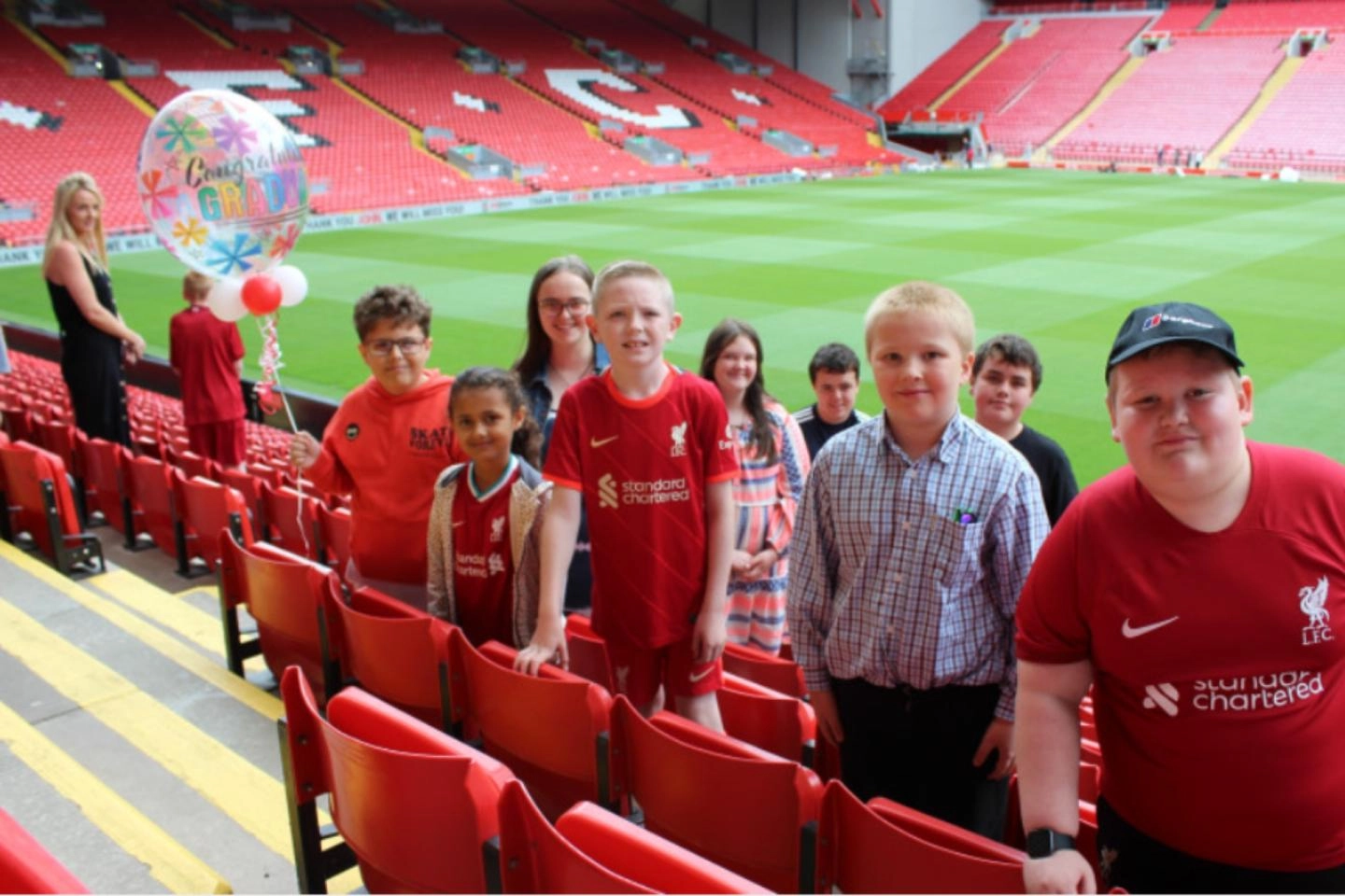 Children in a football stadium