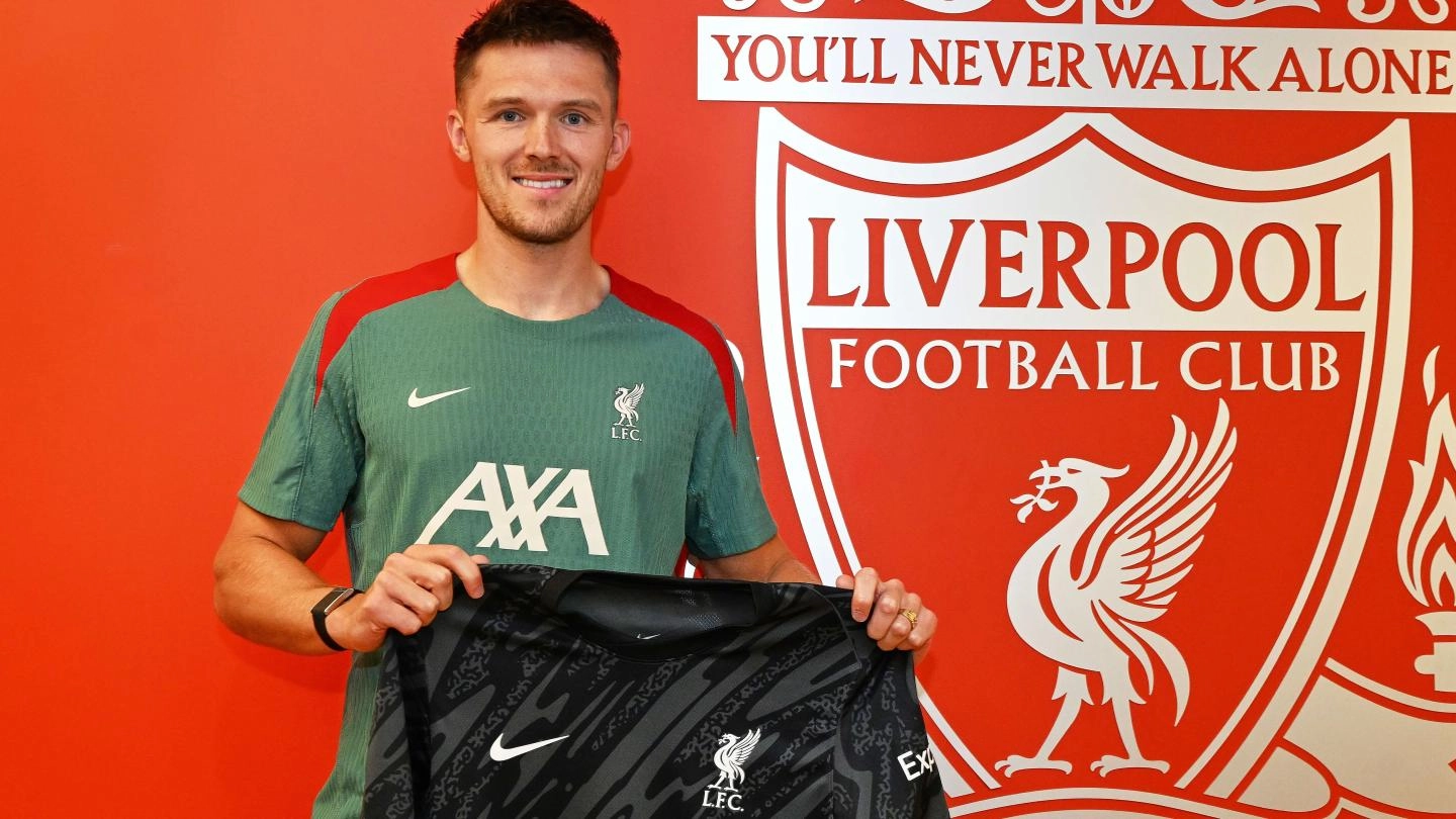 Freddie Woodman poses as a Liverpool player