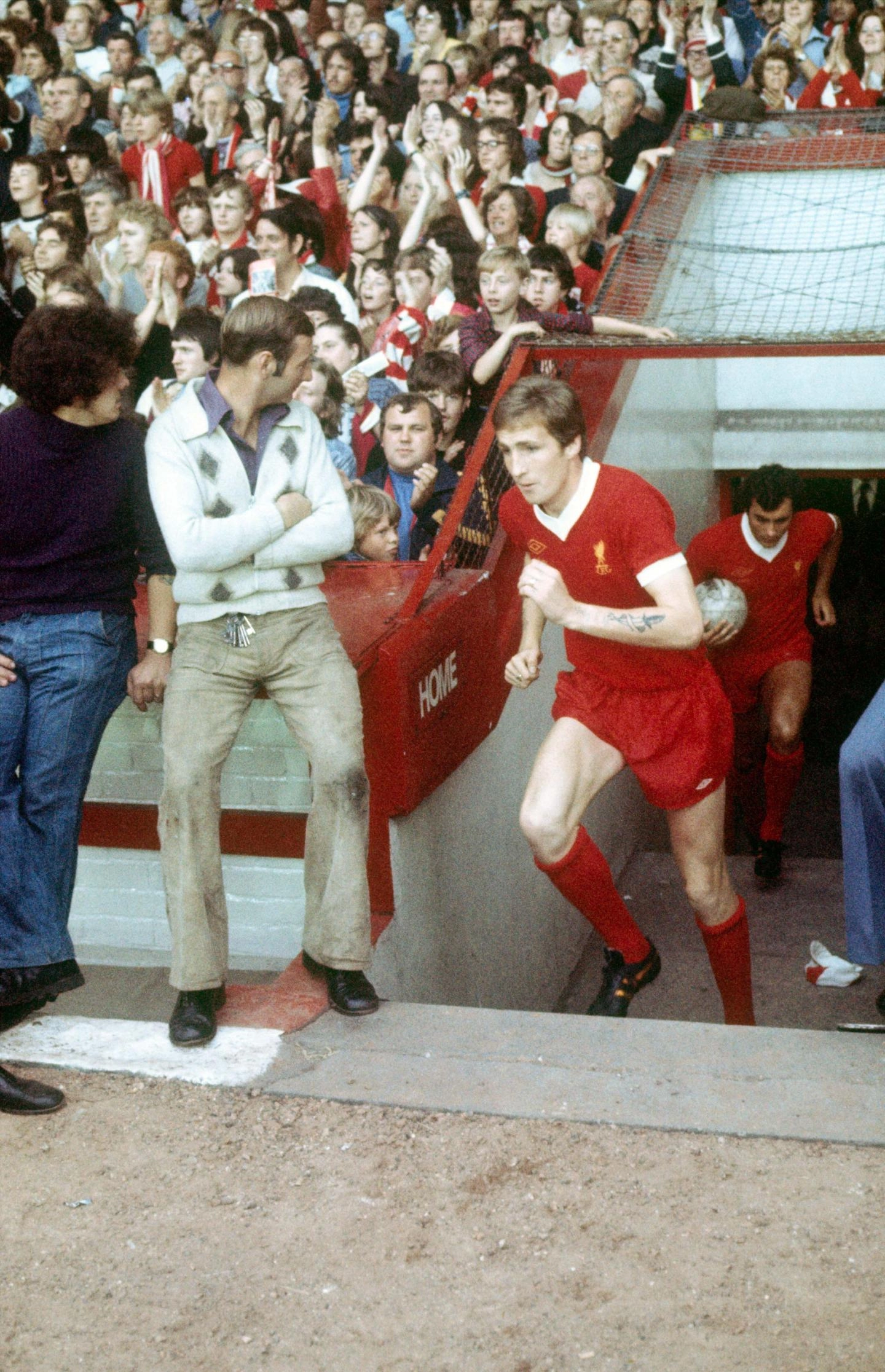 1976: Jones runs out at Anfield during the 1976-77 season.