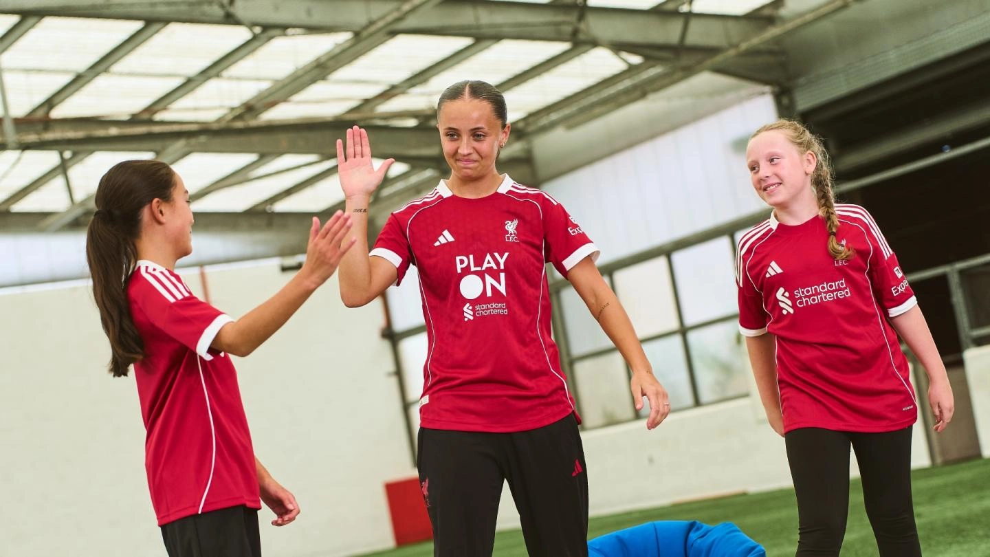 LFC and Standard Chartered spotlight 'Play On' with special front-of-shirt logo swap LFC and Standard Chartered spotlight 'Play On' with special front-of-shirt logo swap