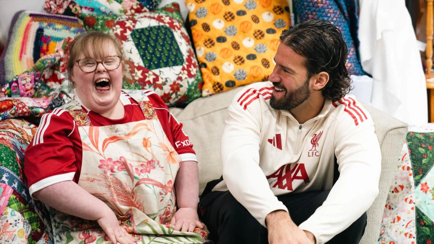 Meet Reagan: Inspirational Reds fan gets sewing with Alisson Becker during special surprise