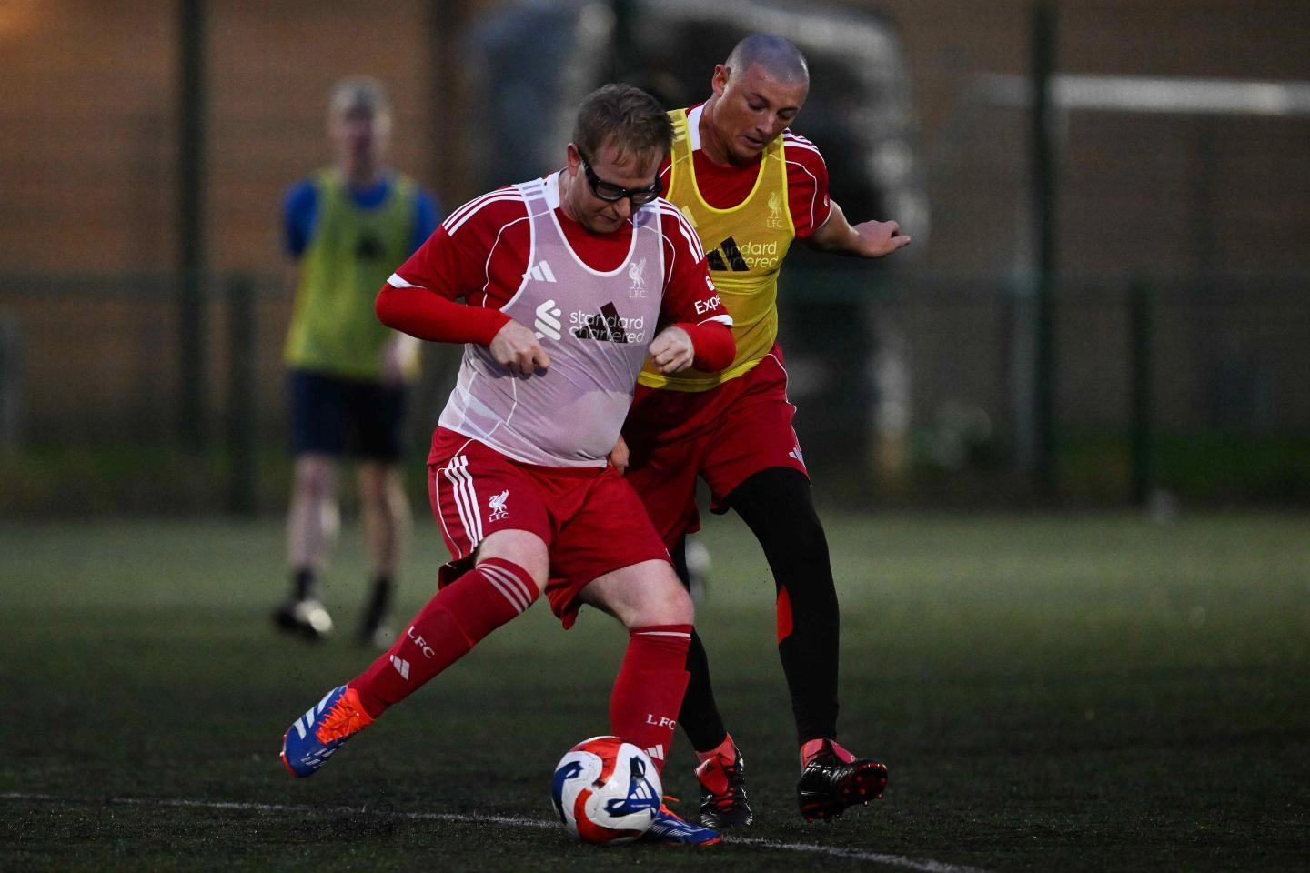 Members of the inclusion football program playing a game