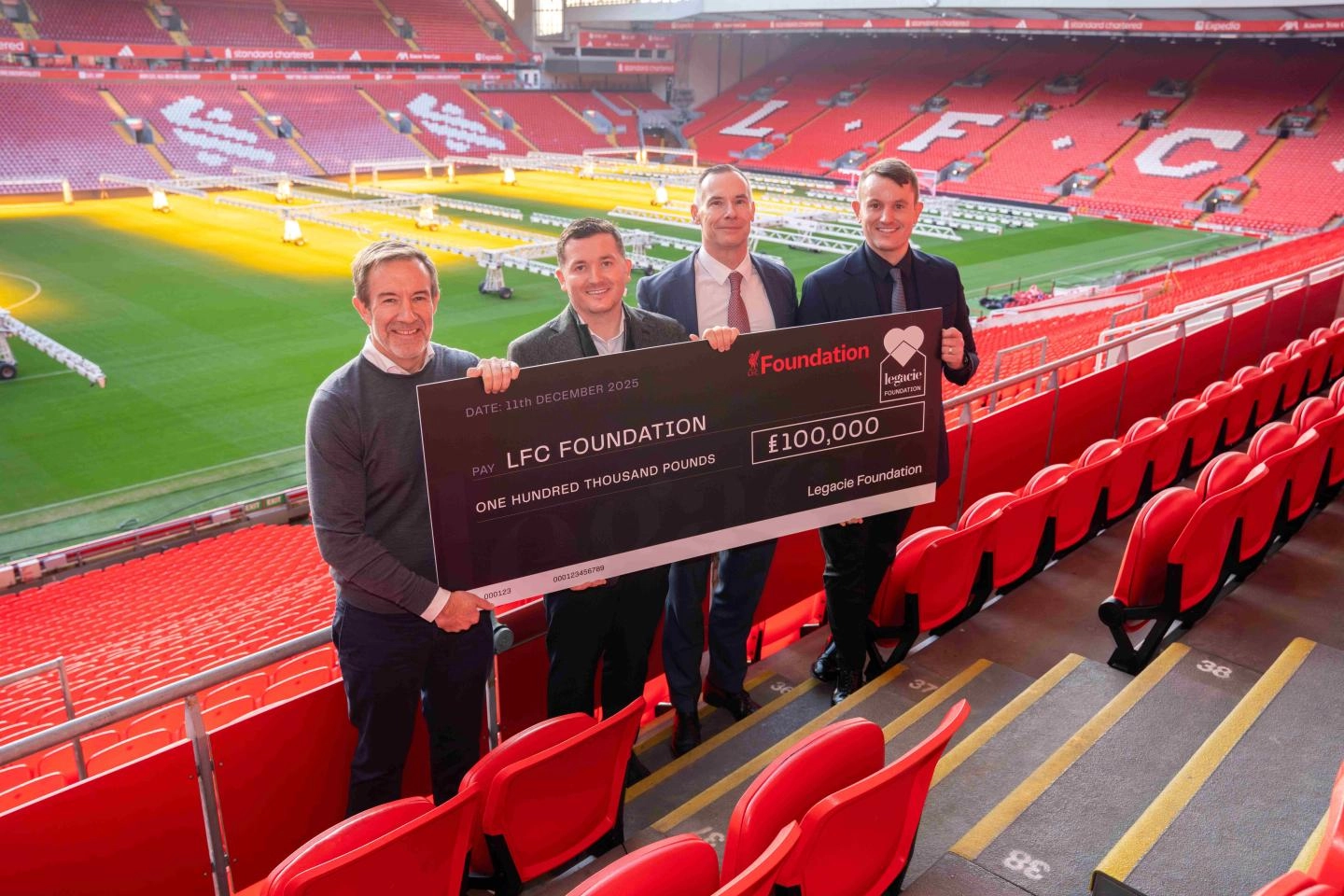 legacie foundation presenting cheque to lfc foundation CEO 