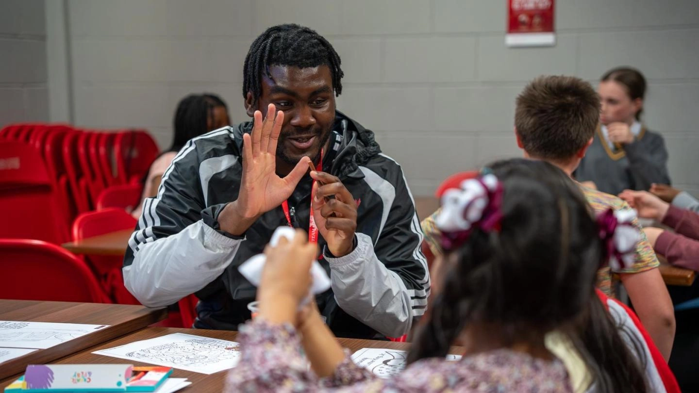 Quevin Nkungi coaching youth work session