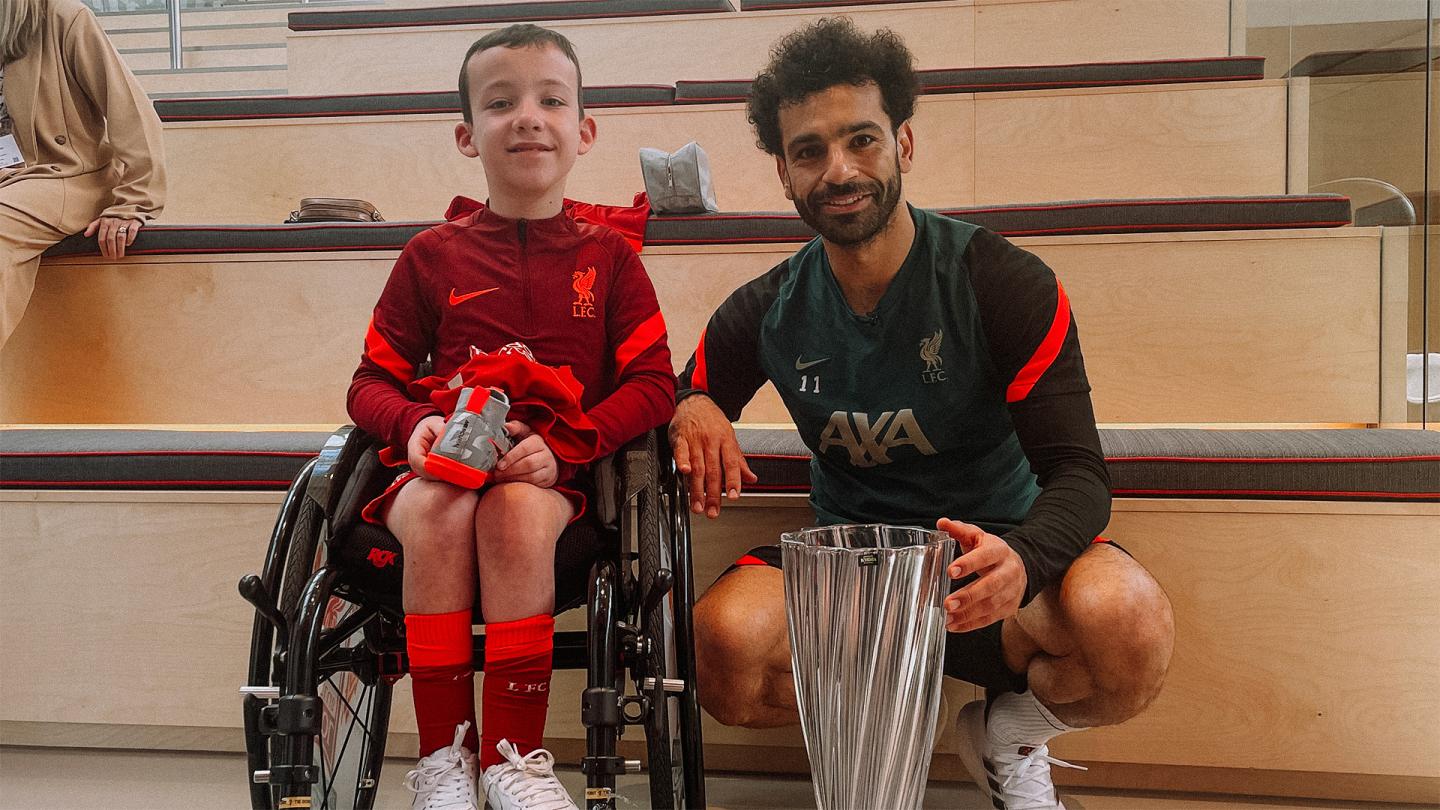  Young Reds fan presents LDSA award to Mo Salah