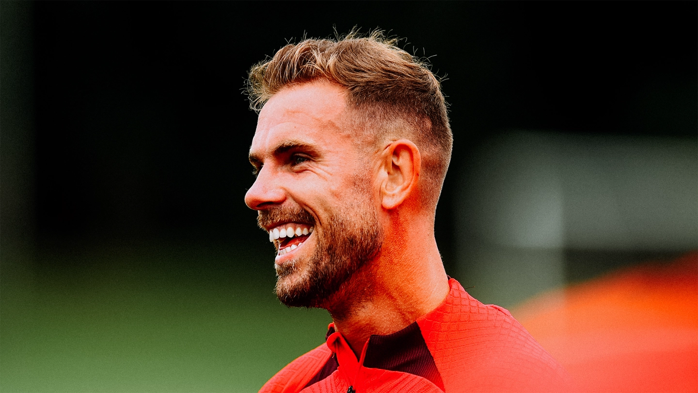 Jordan Henderson collects MBE for services to charity
