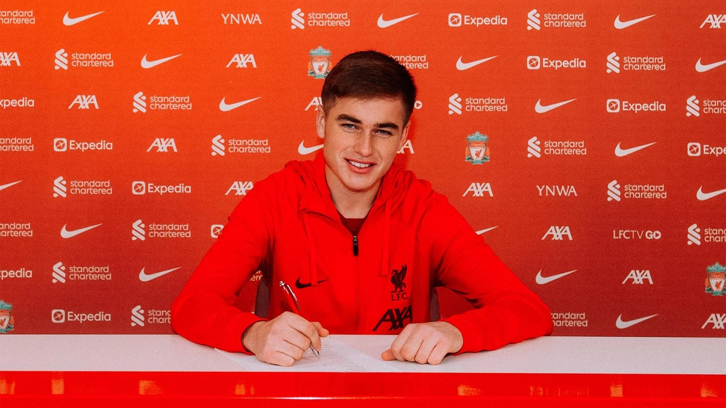 Michael Laffey signs his first pro contract with Liverpool.