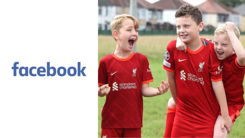 Facebook logo with photo of boys in Liverpool FC kits playing football