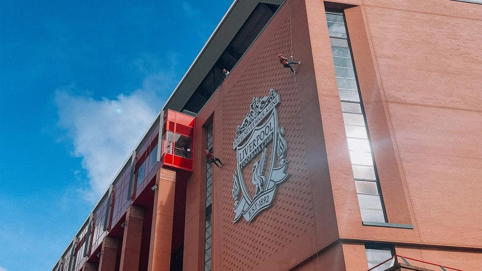 Young fan enjoys Anfield Abseil from home with help of pioneering technology