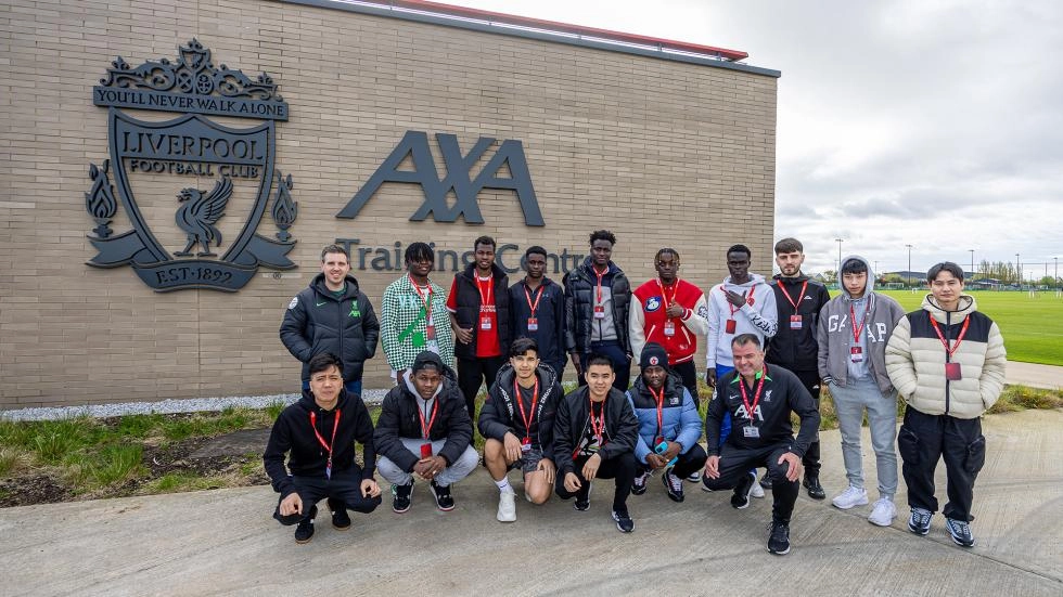 LFC and Sorare Welcome Global Works Refugees to the AXA Training Centre and Anfield Stadium 