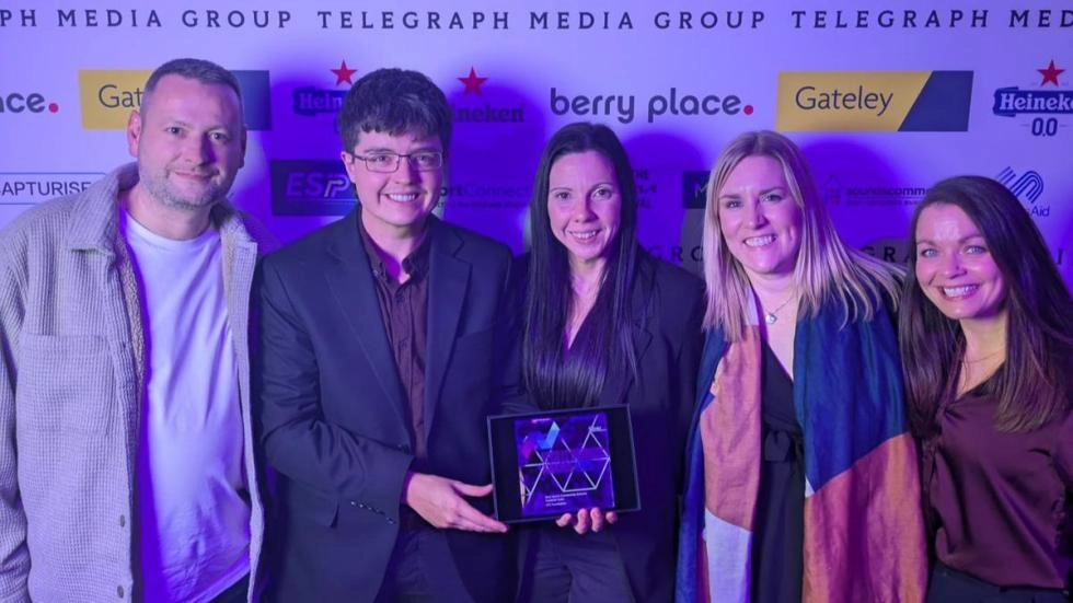 LFC Foundation staff accepting award for best sports community scheme