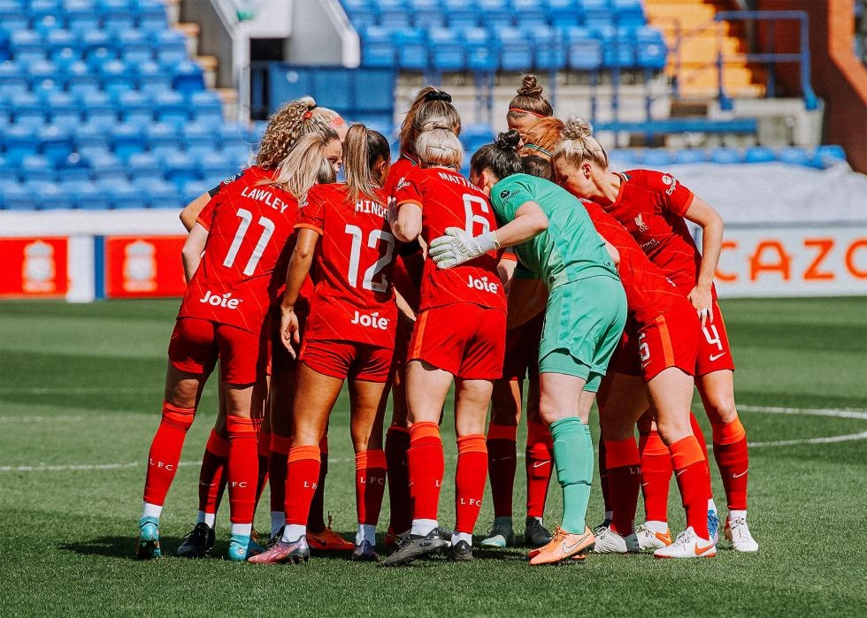 Birkenhead, UK. 24th Apr, 2022. Liverpool team celebrate with trophy after  winning the FA Women's Championship 2021-22 after winning the Womens  Championship football match between Liverpool and Sheffield United 6-1 at  Prenton