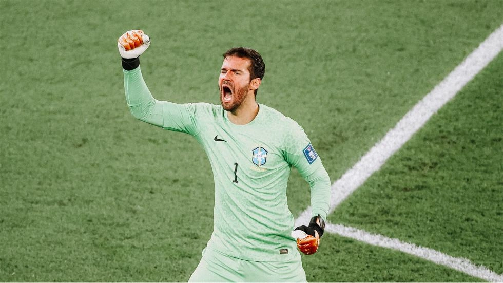 World Cup: Alisson helps Brazil advance to quarter-finals